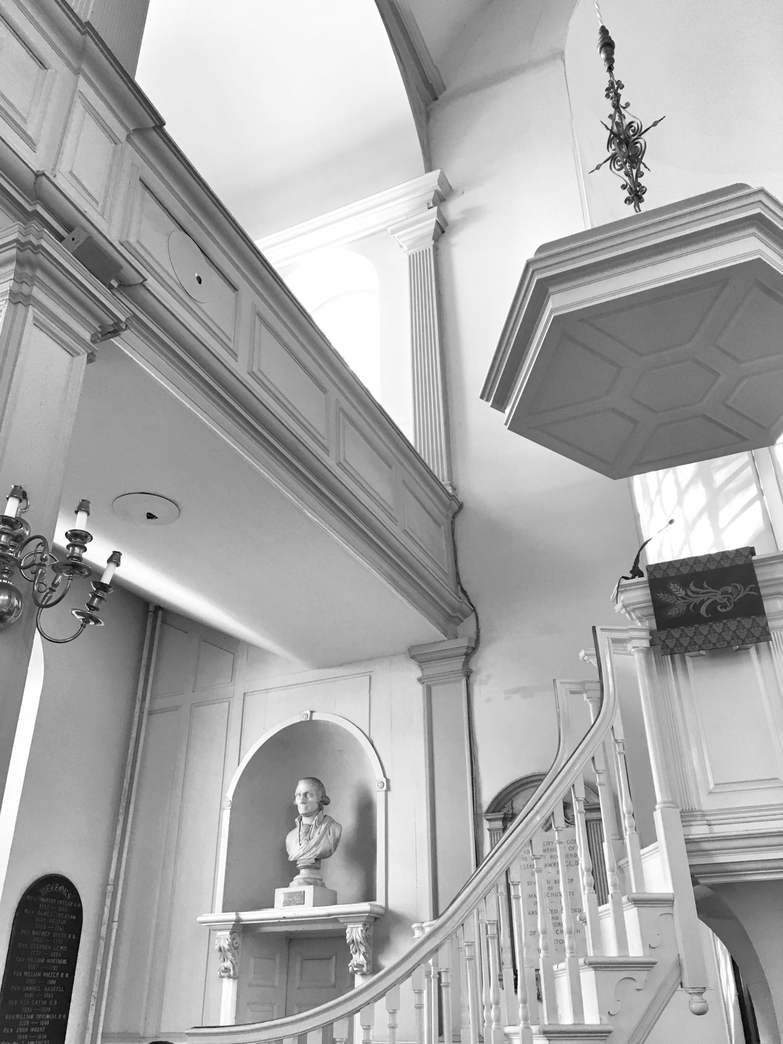 black and white photo inside a boston church